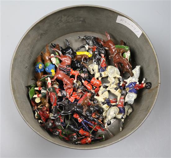 A collection of Britains lead soldiers, cowboys, indians,etc